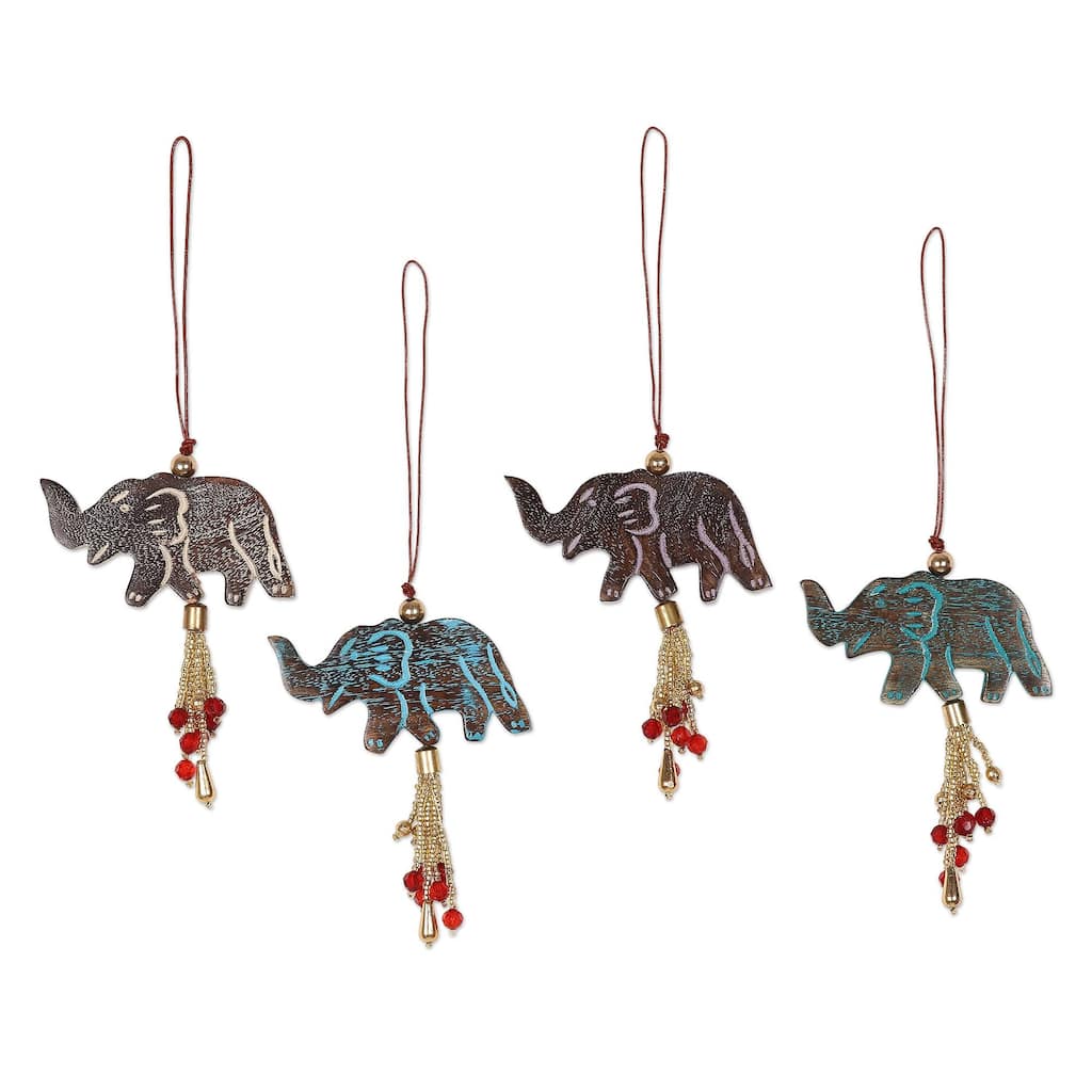 NOVICA Elephant Celebration, Wood ornaments (set of 4) - Each: 1.8" H x 3" W x 0.3" D