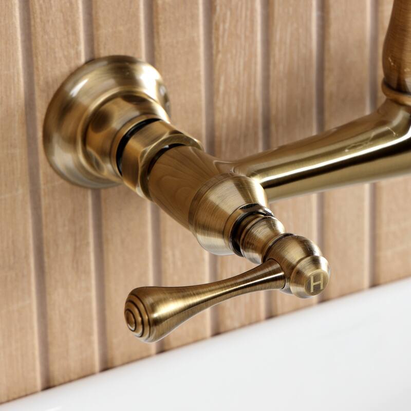 Kingston Brass English Country Two-Handle 2-Hole Wall Mount Bathroom Faucet