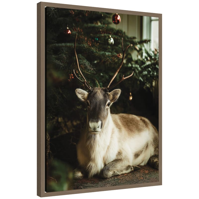 Kate and Laurel Sylvie Framed Canvas Reindeer Sitting Under a Christmas Tree by Michael Schauer - 18 x 24