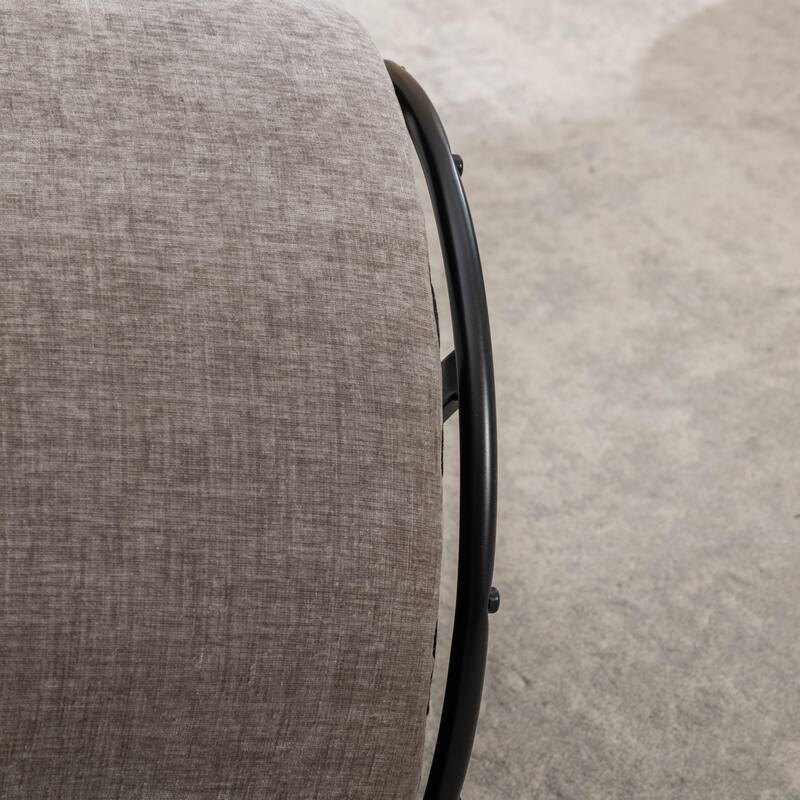 Armchair with black powder coated metal ring