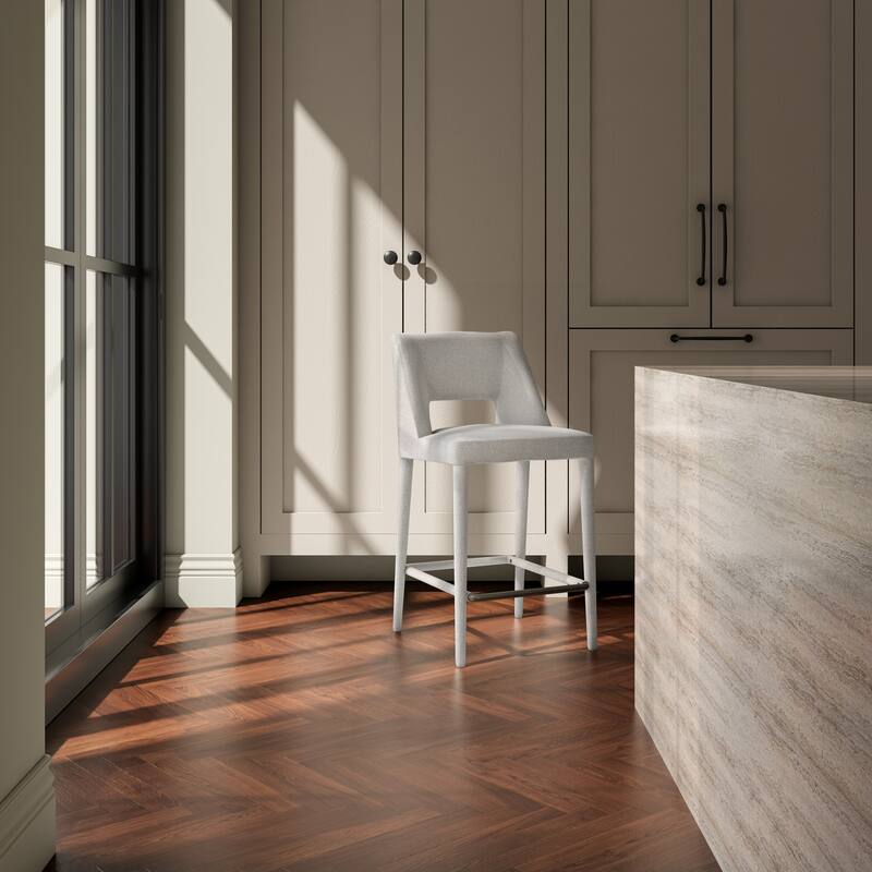 NADAAL STUDIOS Varekian Counter Stool, Fully Upholstered Silhouette with Carved Backrest Detail, Beige