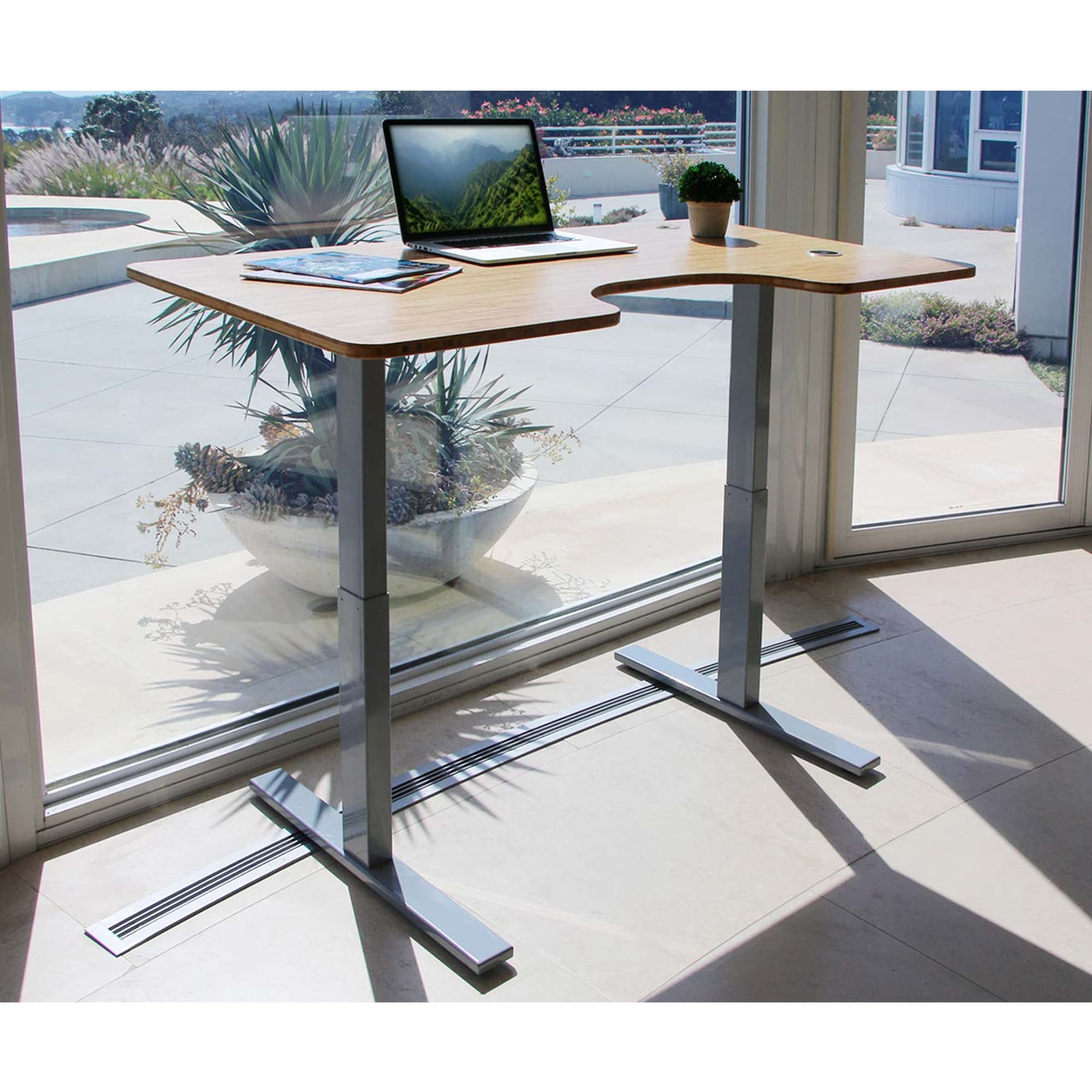 Autonomous height outlet adjustable desk
