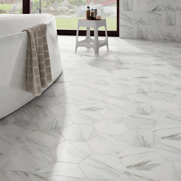 SomerTile Eterno Carrara Hex 8.63" x 9.86" Porcelain Floor and Wall Tile. Opens flyout.