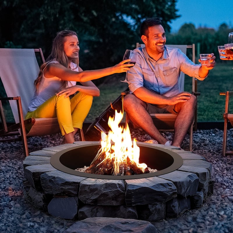 Black Carbon Steel Round Ring Fire Pit Perfect for Outdoor Special Events or Holiday Gatherings