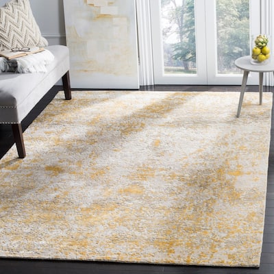SAFAVIEH Couture Handmade Tiffany Hinnerika Modern Abstract Viscose Rug