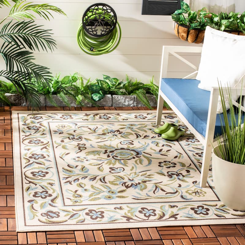 SAFAVIEH Veranda Hripsik Indoor/ Outdoor Waterproof Patio Backyard Rug - 6'7" x 9'6" - Cream/Green