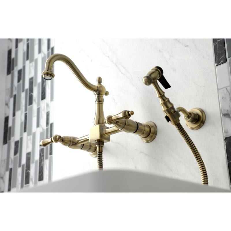 Kingston Brass Heritage Wall Mount Bridge Kitchen Faucet with Brass Sprayer