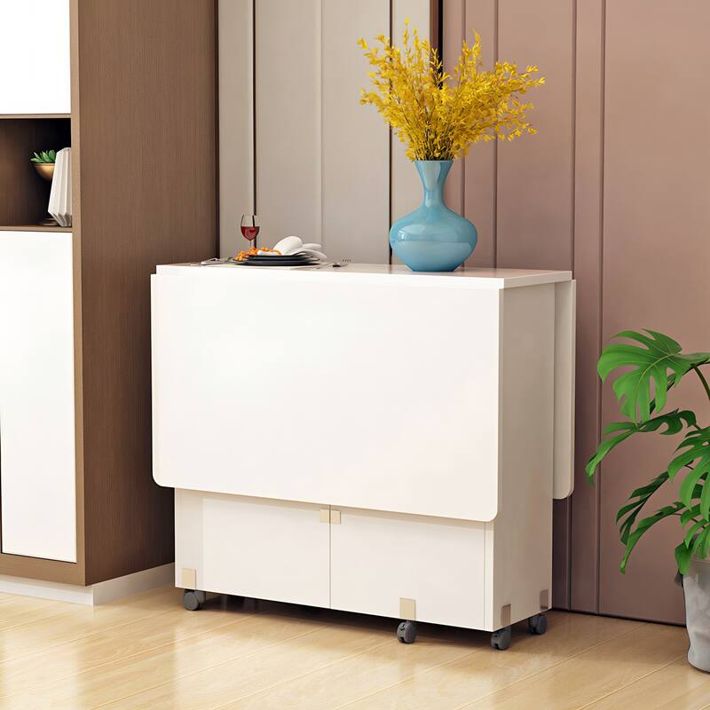 Space-Saving Drop-Leaf Table‌ – 47.2"L x 23.6"W x 30.3"H, White Finish With 6 Wheels & 2-Tier Storage Shelf (Foldable Design)