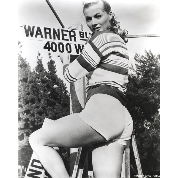Anita-Ekberg-Looking-Back-on-the-Ladder-Fixing-a-Sign-in-Classic-Portrait-Photo-Print.jpg