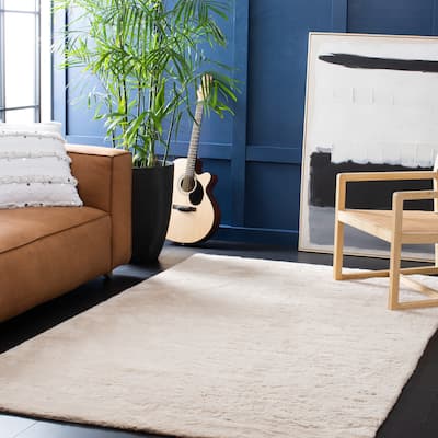 SAFAVIEH Faux Sheep Skin Llinos 2.4-inch Thick Rug