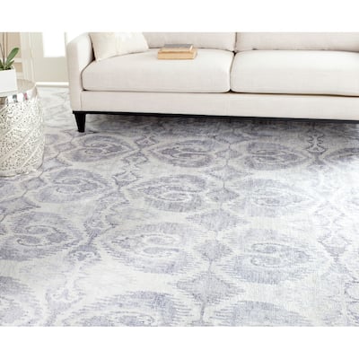 SAFAVIEH Couture Hand-knotted Tibetan Lumnie Modern Wool Rug
