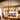 5-Light Metal Modern Industrial Linear Cage Kitchen Island Pendant Cylinder Candle Chandelier with Clear Glass