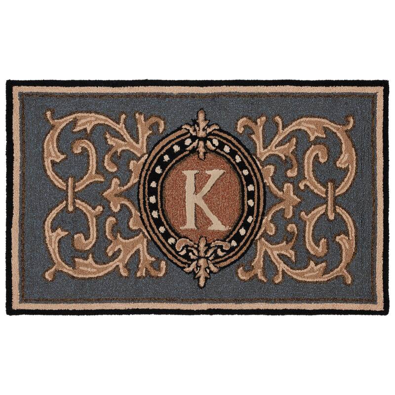 SAFAVIEH Handmade Monogram Griseldis Casual Rug