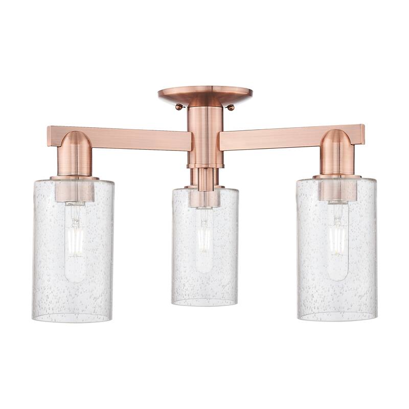 Innovations Lighting Endless Possibilities Arcadia - Clymer - 3 Light 21" Semi-Flush Mount - Antique Copper/Seedy