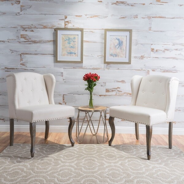 two accent chairs and table