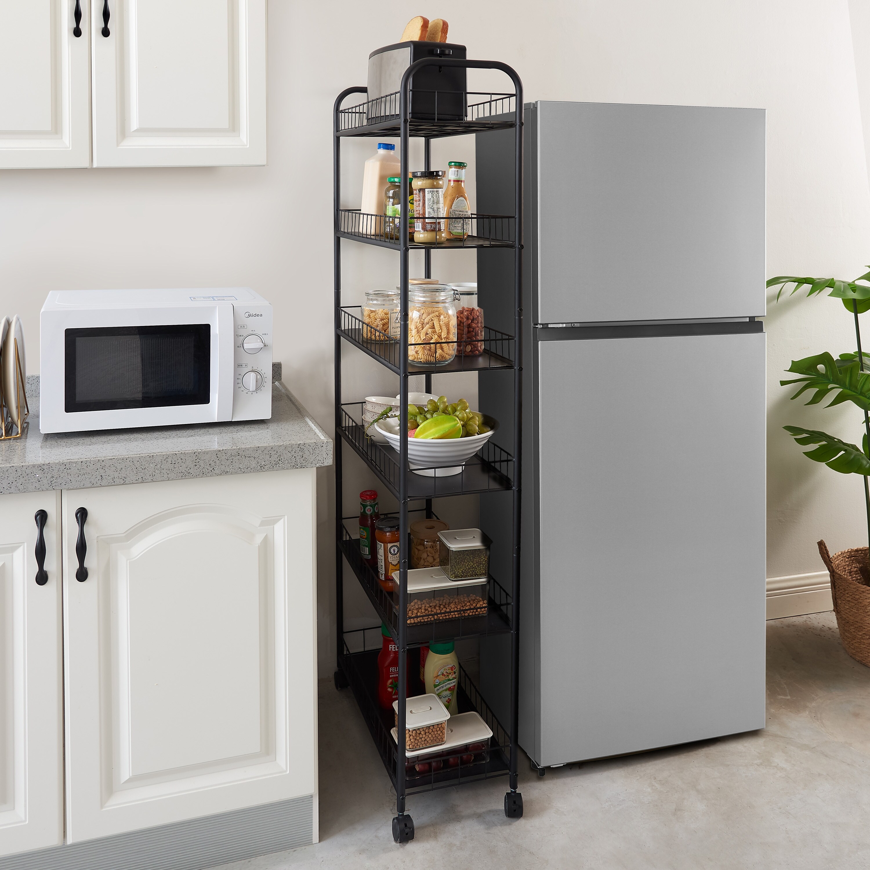 Narrow shelving unit on wheels store