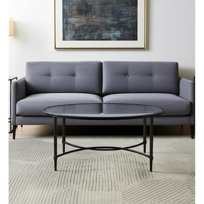 HomeRoots 45" Clear and Black Glass and Metal Oval Coffee Table - 19" H x 45" W x 25" D