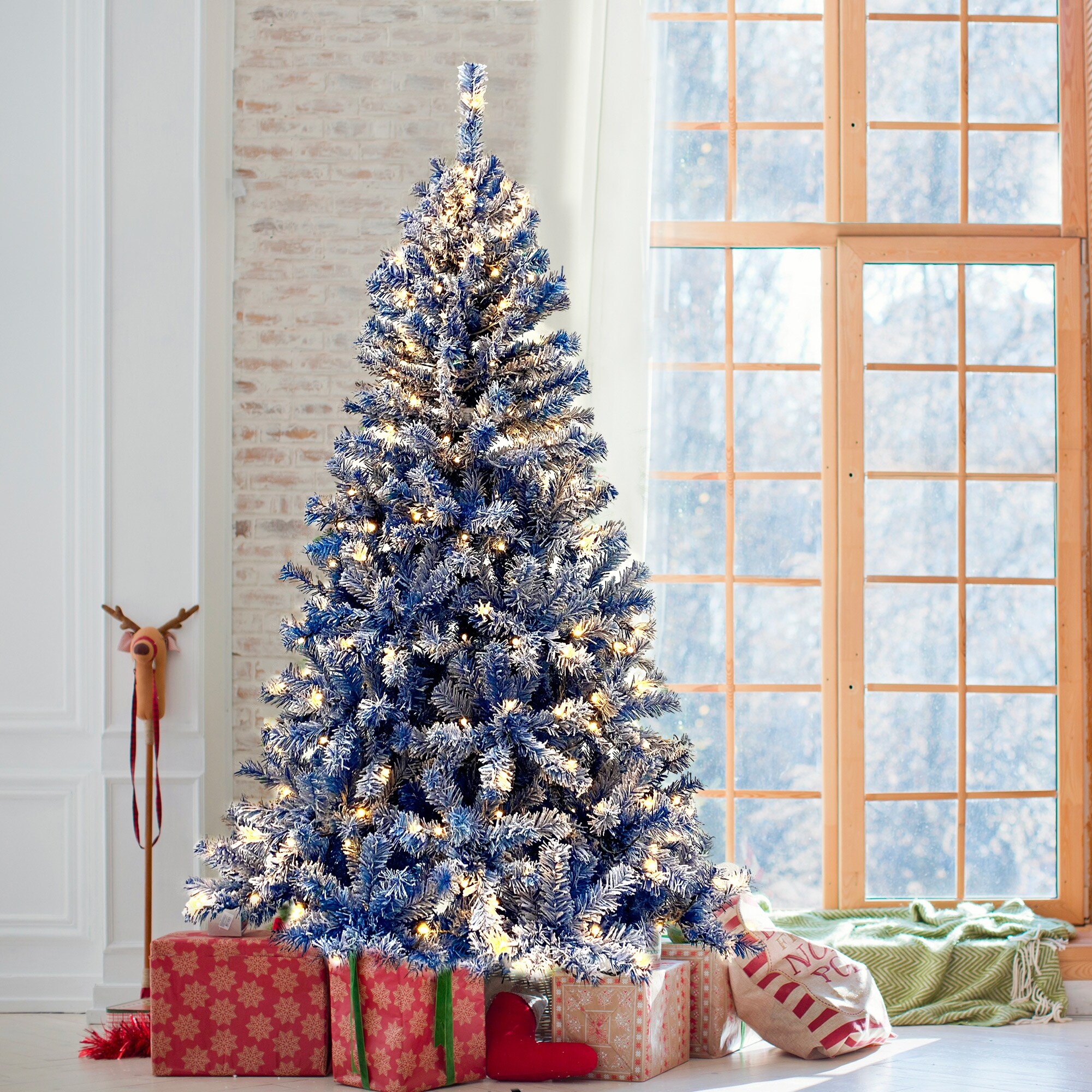 Pre lit snow flocked christmas tree hot sale