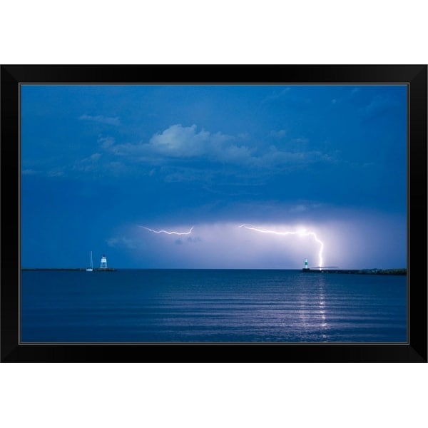 "Lightning storm over a lighthouse, Lake Superior" Black Framed Print