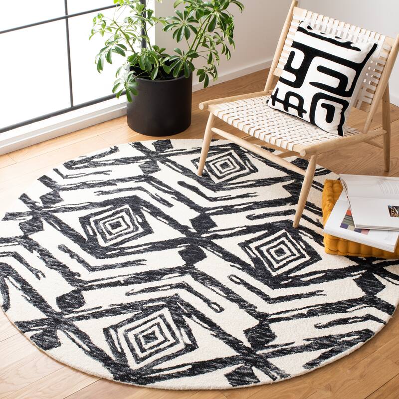 SAFAVIEH Handmade Metro Jorine Modern Abstract Wool Rug - 6' Round - Black/Ivory