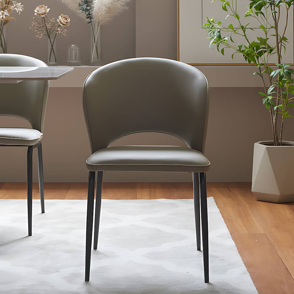 Modern Curved Faux Leather Upholstered Dining Chair with Cutout Back and Black Metal Legs