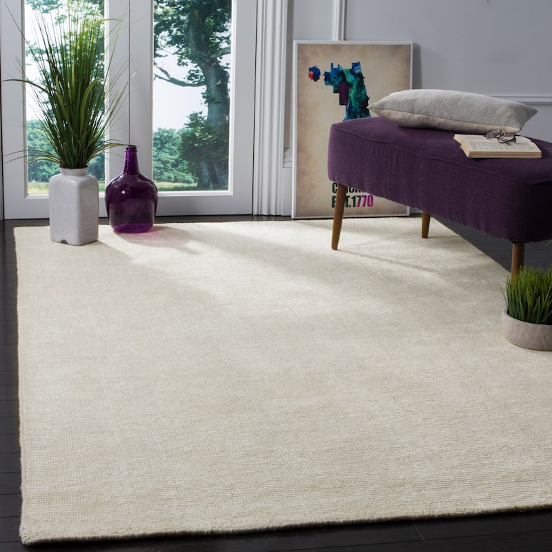 SAFAVIEH Hand-knotted Stone Wash Gulan Modern Wool Rug - 4' x 6' - Ivory - Rectangle