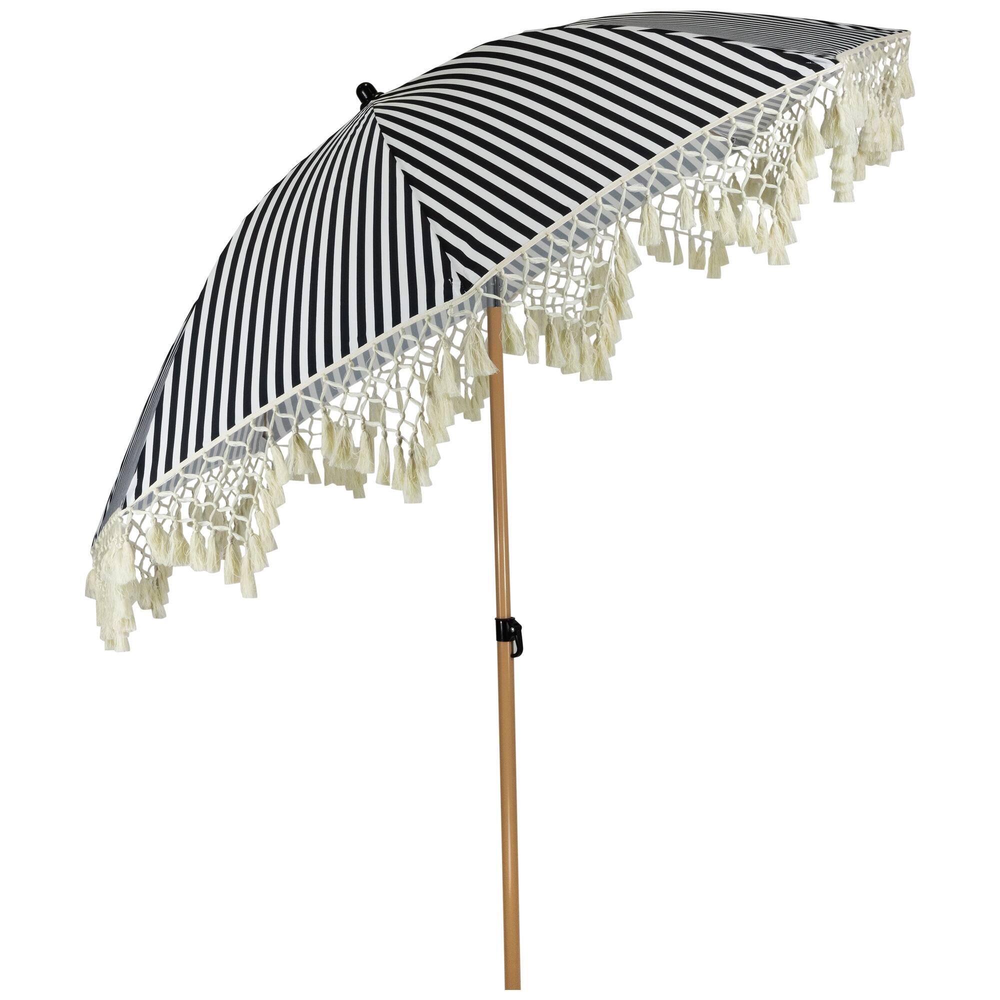 black and white striped patio umbrella Business & Pleasure Co. The Put together the ideal combination of umbrella frame and all Stripe Macrame Boho Beach Market