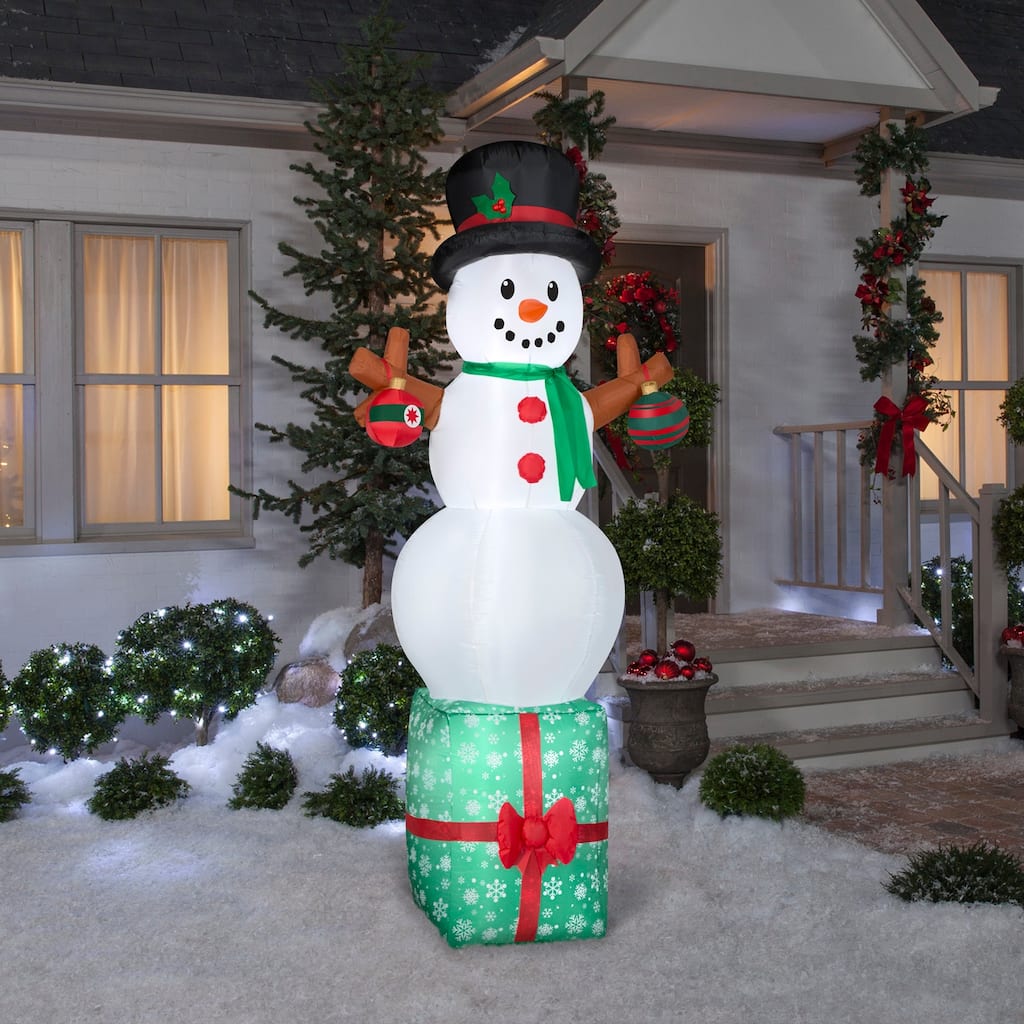 Gemmy Christmas Inflatable Snowman on Gift Box, 7 ft Tall