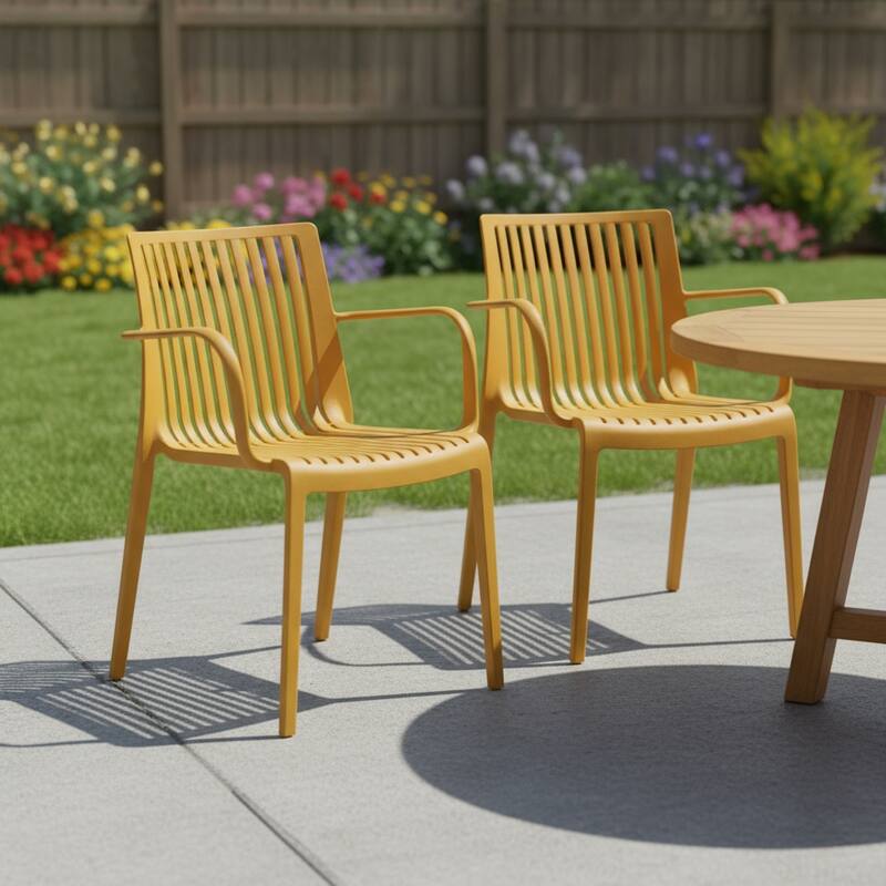 HomeRoots Set of Two Yellow Heavy Duty Plastic Outdoor Stacking Arm Chairs