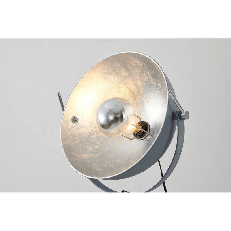 1 Light Grey Tripod Leg Floor Lamp With a Silver Leaf Interior Shade