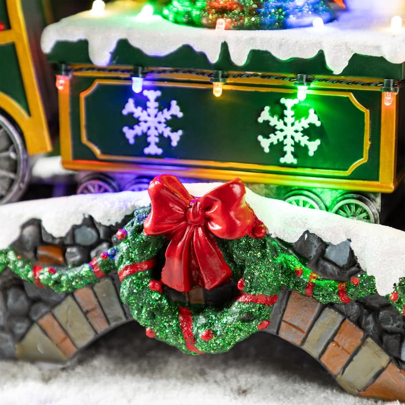 Glitzhome 20"L Lighted Christmas Santa Train Resin Village with Movement and Music