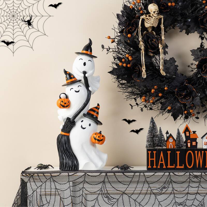 Glitzhome 21.75"H Halloween Resin Stacked Ghost Riding a Broom Figurine Porch Decor