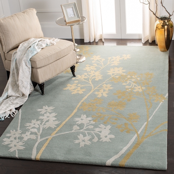 SAFAVIEH Handmade Soho Soccorsa N.Z. Wool Rug. Opens flyout.