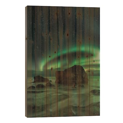 Aurora Borealis As Seen From Utakleiv Beach, Nordland, Norway Print On Wood by Ajit Menon - Multi-Color