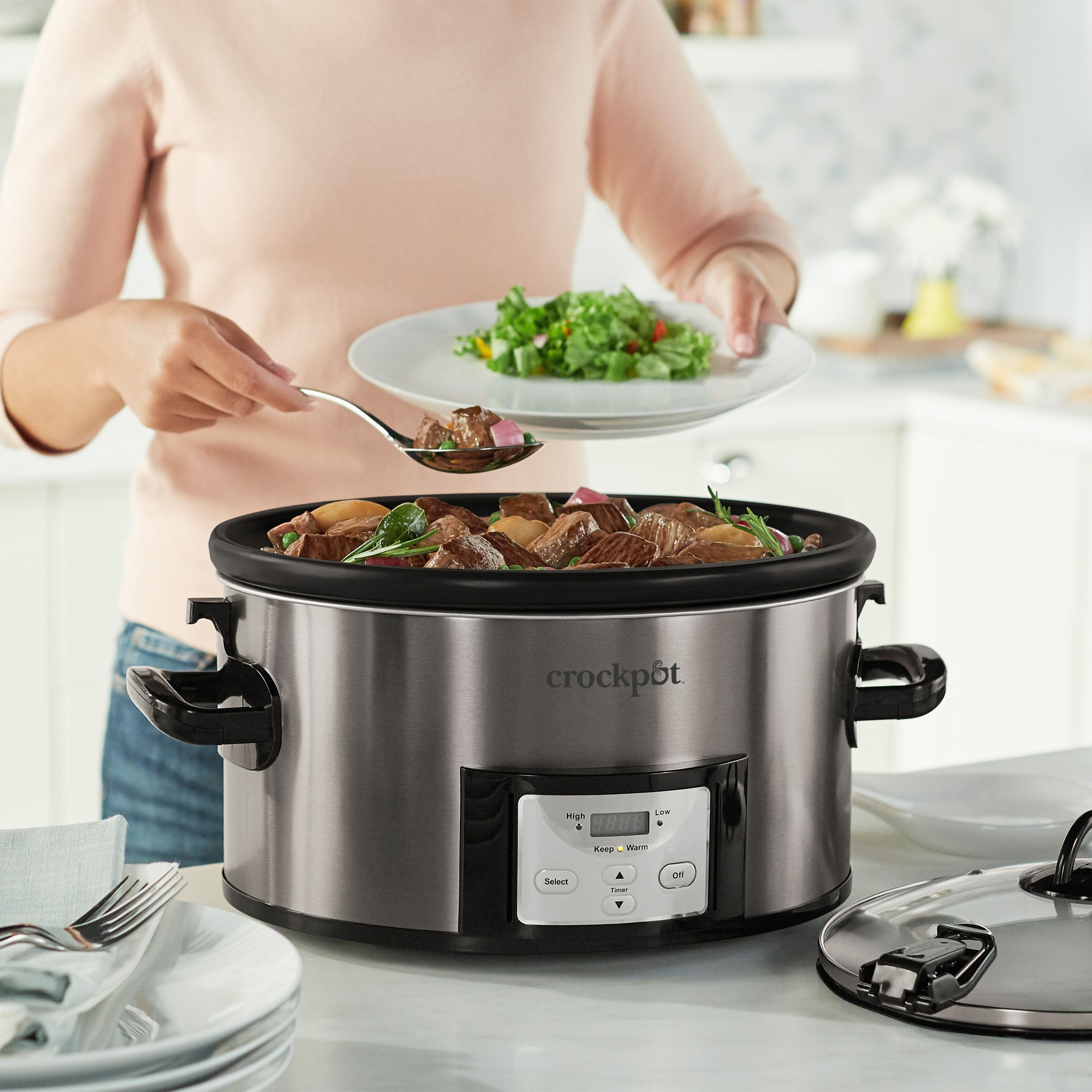 https://ak1.ostkcdn.com/images/products/is/images/direct/ba41227eea805c026b2fb79d74587611a32f7538/Crockpot-7-Quart-Easy-to-Clean-Cook-%26-Carry-Slow-Cooker%2C-Black-Stainless-Steel.jpg