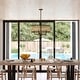 preview thumbnail 7 of 12, Berens 5 Light Matte Black Modern Farmhouse Drum Pendant Fixture with Rattan Cane Shade - 24-in W x 13.5-in H x 24-in D
