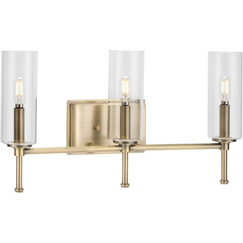 Elara Collection 3-light Vintage Brass Clear Glass Bath Vanity Light - 22.125 in x 5.12 in x 11.5 in - 22.125 in x 5.12 in x 11.5 in