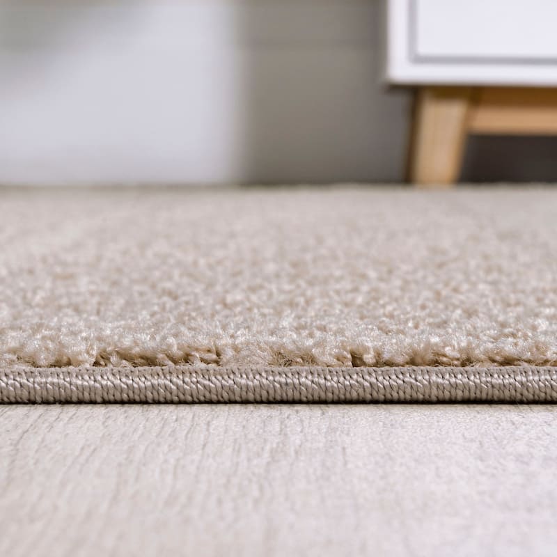 JONATHAN Y Duenas High-Low Two-Tone Monstera Leaf Area Rug