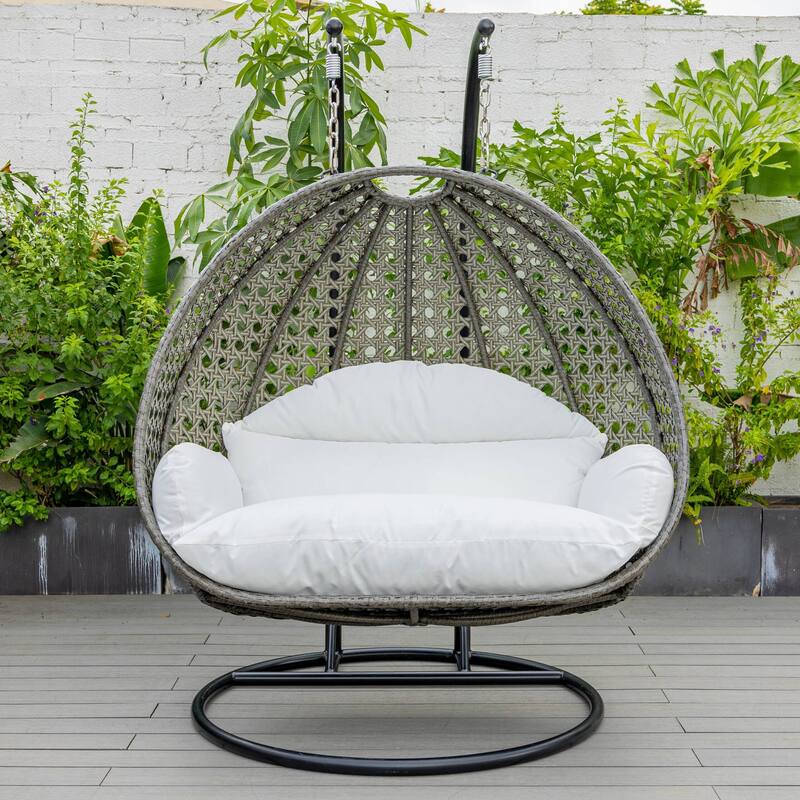 LeisureMod 2-Person Hanging Egg Swing Chair with Metal Stand - Handcrafted Charcoal Wicker, Patio Hammock Lounger with Cushions