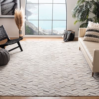 SAFAVIEH Handmade Studio Leather Tanesha Natural Hide Leather Rug