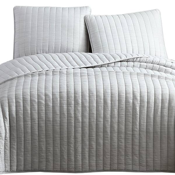 Triomphe quilted coverlet by yves delorme. usd