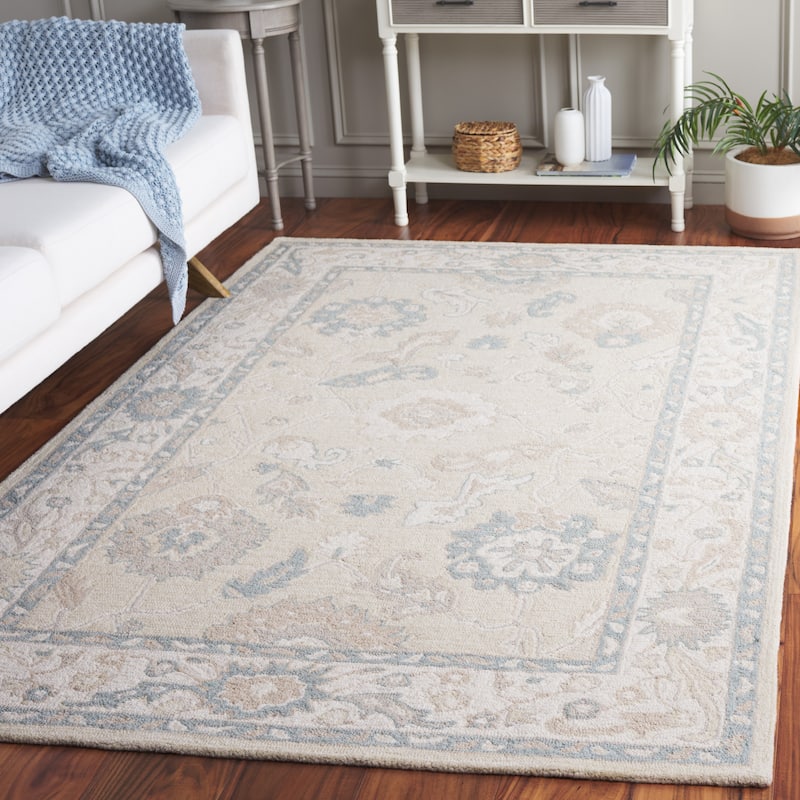 SAFAVIEH Handmade Ebony Yulija Modern & Contemporary Wool Rug - 6' x 9' - Beige/Ivory