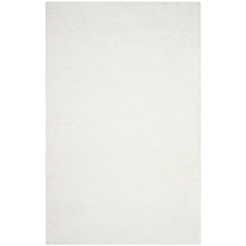 SAFAVIEH Handmade Sheep Shag Dochia Solid Polyester Rug - 4' x 6' - Ivory