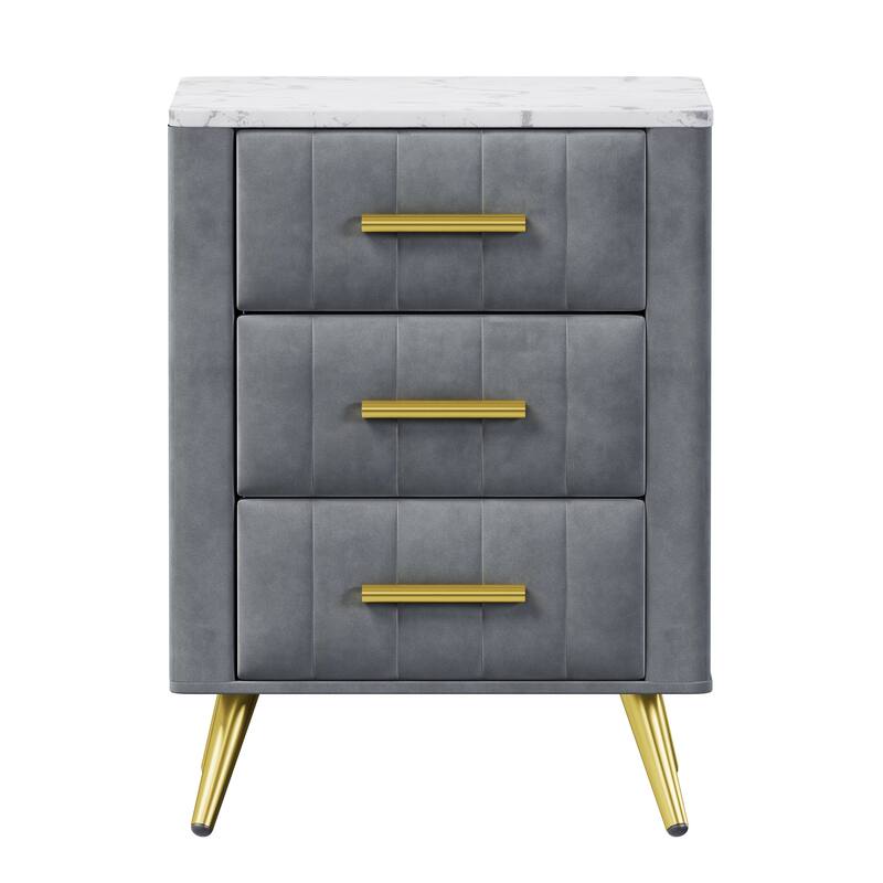 Upholstered Wooden Nightstand Featuring Three Drawers With Metal Legs And Handles.