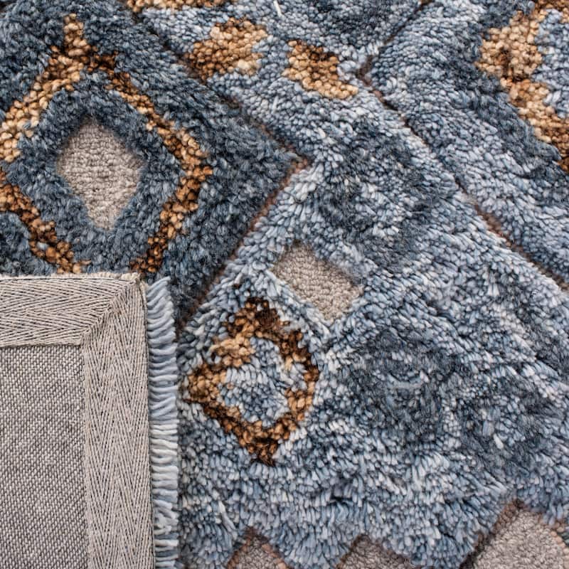 SAFAVIEH Handmade Casablanca Shag Grainne Tribal Wool Rug