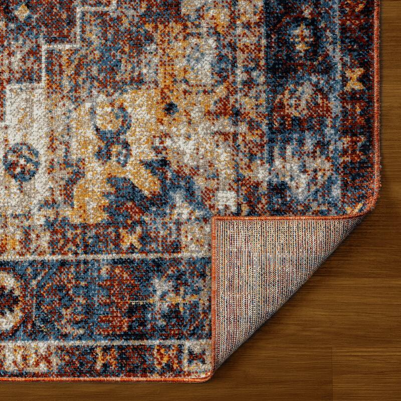 Sevita Distressed Bordered Blue Orange Medallion Machine-Washable Rug