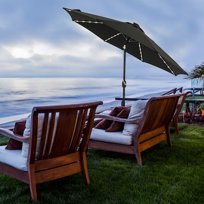 Island Umbrella Mirage Fiesta 9-ft Octagon Market Umbrella with Solar LED Tube Lights