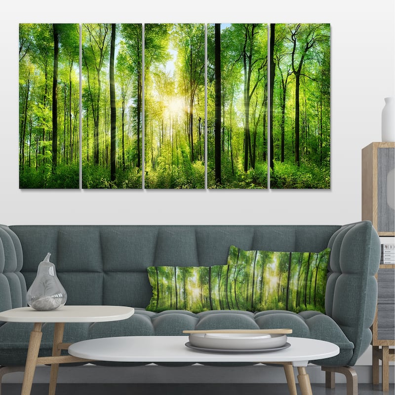 Designart "Forest with Rays of Sun Panorama" Landscape Canvas Print - 60 in. wide x 28 in. high - 5 Equal Panels