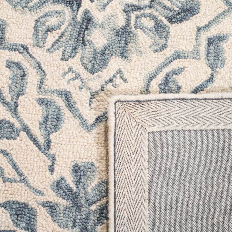 SAFAVIEH Handmade Dip Dye Nicki Floral Wool Rug