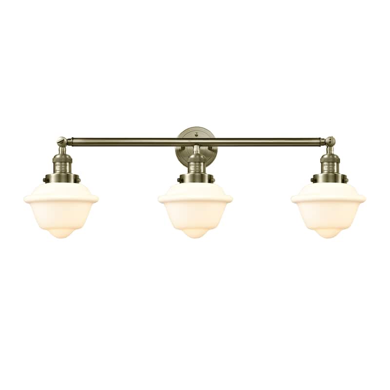 Innovations Lighting Oxford - 3 Light 34" Bath Vanity Light - Antique Brass/Matte White